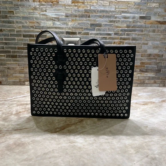 ALAÏA Mina Small perforated leather tote bag - Picture 6 of 14